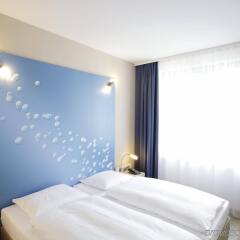Отель H2 Hotel Berlin Alexanderplatz Германия, Берлин - 5 отзывов об отеле, цены и фото номеров - забронировать отель H2 Hotel Berlin Alexanderplatz онлайн комната для гостей фото 4