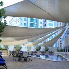 Отель Swiss-Belhotel Sharjah ОАЭ, Шарджа - отзывы, цены и фото номеров - забронировать отель Swiss-Belhotel Sharjah онлайн бассейн фото 2