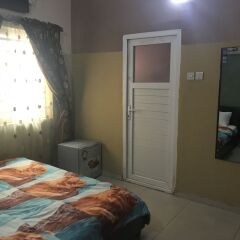 Отель Richmond Hills Suites Нигерия, Энугу - отзывы, цены и фото номеров - забронировать отель Richmond Hills Suites онлайн комната для гостей
