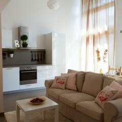 Апартаменты Ricci Apartments комната для гостей