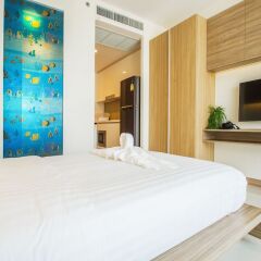 Отель Riviera Wongamat Condo By Favstay Паттайя комната для гостей фото 3