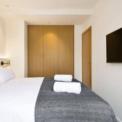 Отель Uma Suites Metropolitan комната для гостей