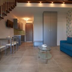Апартаменты Grey House Apartments гостиничный бар