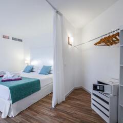 Отель FERGUS Style Cala Blanca Suites сейф в номере