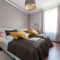 Апартаменты WarsawLiving - Cybernetyki Apartments комната для гостей фото 4