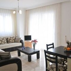 Апартаменты Hisar Garden Apartments Олудениз комната для гостей фото 2