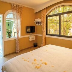 Отель Xiamen Gulangyu Sunshine Dora's House Китай, Сямынь - отзывы, цены и фото номеров - забронировать отель Xiamen Gulangyu Sunshine Dora's House онлайн комната для гостей фото 4