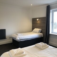 Апартаменты Glasgow Airport Apartments Пейсли комната для гостей фото 5