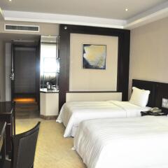 Metropolitan Yijing Hotel - Dongguan комната для гостей