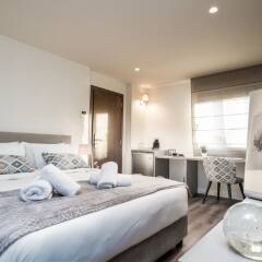Отель Urban Nest - Suites & Apartments Греция, Афины - отзывы, цены и фото номеров - забронировать отель Urban Nest - Suites & Apartments онлайн комната для гостей
