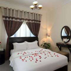 Отель Al Smou Hotel Apartments ОАЭ, Аджман - отзывы, цены и фото номеров - забронировать отель Al Smou Hotel Apartments онлайн комната для гостей фото 2