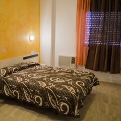 Hotel Muñoz комната для гостей