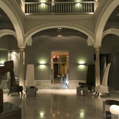 Отель Petit Palace Santa Cruz Испания, Севилья - отзывы, цены и фото номеров - забронировать отель Petit Palace Santa Cruz онлайн интерьер отеля фото 2