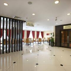 London Suites Hotel интерьер отеля
