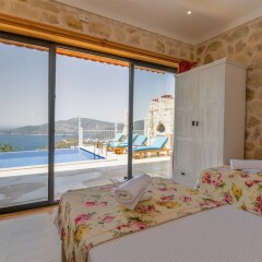 Villa Sur by Akdenizvillam Турция, Калкан - отзывы, цены и фото номеров - забронировать отель Villa Sur by Akdenizvillam онлайн комната для гостей