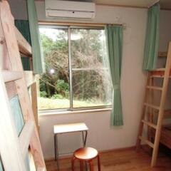 Отель Guesthouse Yakushima Япония, Якусима - отзывы, цены и фото номеров - забронировать отель Guesthouse Yakushima онлайн комната для гостей фото 2