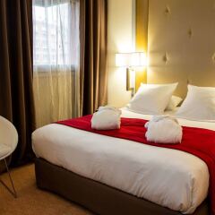 Отель Privilège Hôtel Mermoz Франция, Тулуза - отзывы, цены и фото номеров - забронировать отель Privilège Hôtel Mermoz онлайн комната для гостей фото 5