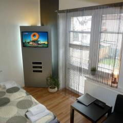 Отель Apartma SunGarden Liberec Чехия, Либерец - отзывы, цены и фото номеров - забронировать отель Apartma SunGarden Liberec онлайн комната для гостей