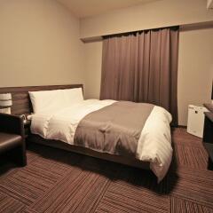 Отель Dormy Inn Premium Hakata Canal City Mae комната для гостей