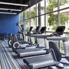 Отель Aloft Tulsa Downtown США, Талса - отзывы, цены и фото номеров - забронировать отель Aloft Tulsa Downtown онлайн фитнесс-зал