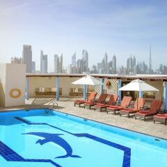 Отель Jumeira Rotana бассейн фото 2