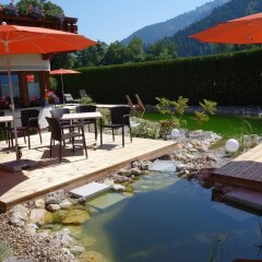 Отель Aparthotel Bergland Австрия, Зёлль - отзывы, цены и фото номеров - забронировать отель Aparthotel Bergland онлайн бассейн