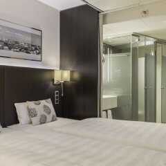 Отель Park Inn by Radisson Berlin Alexanderplatz комната для гостей фото 8
