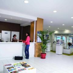 Отель Terres de France - Le Domaine du Golf Франция, Сомюр - отзывы, цены и фото номеров - забронировать отель Terres de France - Le Domaine du Golf онлайн интерьер отеля