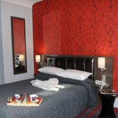 Отель Grand Hôtel Lévêque сейф в номере