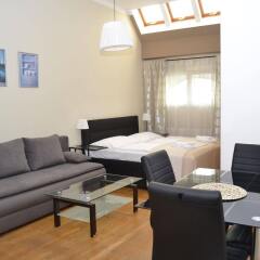 Апартаменты Melantrich Apartments комната для гостей фото 3
