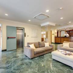 Romoli Hotel интерьер отеля