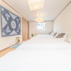 Отель AMP FLAT Haruyoshi A Фукуока комната для гостей