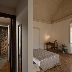 Отель Fra I Sassi - Residence Матера комната для гостей