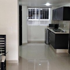 Отель Grupo Kings Suites Chimborazo Мехико в номере