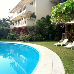 Отель Departamento Real de Palmas бассейн