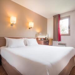 Hotel Kyriad Le Bourget Centre-Parc des Expositions комната для гостей фото 2