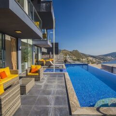Villa Almeria 2 by Akdenizvillam Турция, Калкан - отзывы, цены и фото номеров - забронировать отель Villa Almeria 2 by Akdenizvillam онлайн бассейн фото 3