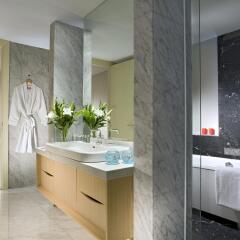 Отель Ascott Raffles Place Singapore ванная