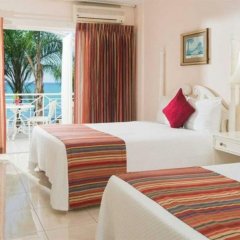 Отель SeaGarden Beach Resort - All Inclusive Ямайка, Монтего-Бей - отзывы, цены и фото номеров - забронировать отель SeaGarden Beach Resort - All Inclusive онлайн комната для гостей фото 5