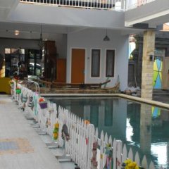 Отель RedDoorz Syariah near Puri Agung Denpasar Индонезия, Бали - отзывы, цены и фото номеров - забронировать отель RedDoorz Syariah near Puri Agung Denpasar онлайн бассейн фото 2