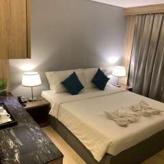 Отель Green Suites at Bel Air Soho Филиппины, Макати - отзывы, цены и фото номеров - забронировать отель Green Suites at Bel Air Soho онлайн комната для гостей фото 3