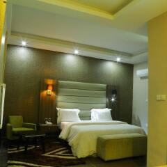 Отель Golden Tulip Essential Benin City комната для гостей фото 5