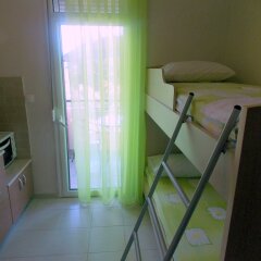 Апартаменты Nikos Apartments в номере
