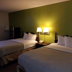 Отель Travel Inn - Columbus North США, Колумбус - отзывы, цены и фото номеров - забронировать отель Travel Inn - Columbus North онлайн комната для гостей фото 4