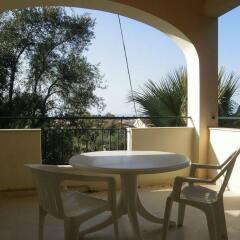 Отель Mr & Mrs White Corfu Греция, Корфу - отзывы, цены и фото номеров - забронировать отель Mr & Mrs White Corfu онлайн балкон