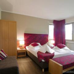 Flora Hotel & Suites Меран комната для гостей