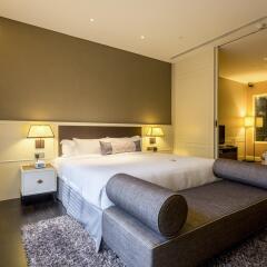 Отель Ascott Raffles Place Singapore комната для гостей