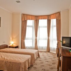 Ligena Econom Hotel комната для гостей фото 5