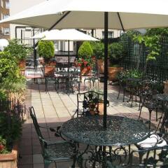 Отель Roof Garden Rooms Лондон