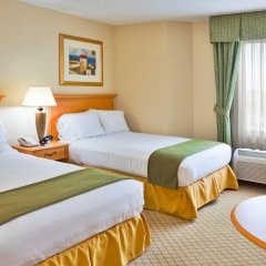 Отель Holiday Inn Express & Suites Nearest Universal Orlando, an IHG Hotel США, Орландо - 1 отзыв об отеле, цены и фото номеров - забронировать отель Holiday Inn Express & Suites Nearest Universal Orlando, an IHG Hotel онлайн комната для гостей фото 2